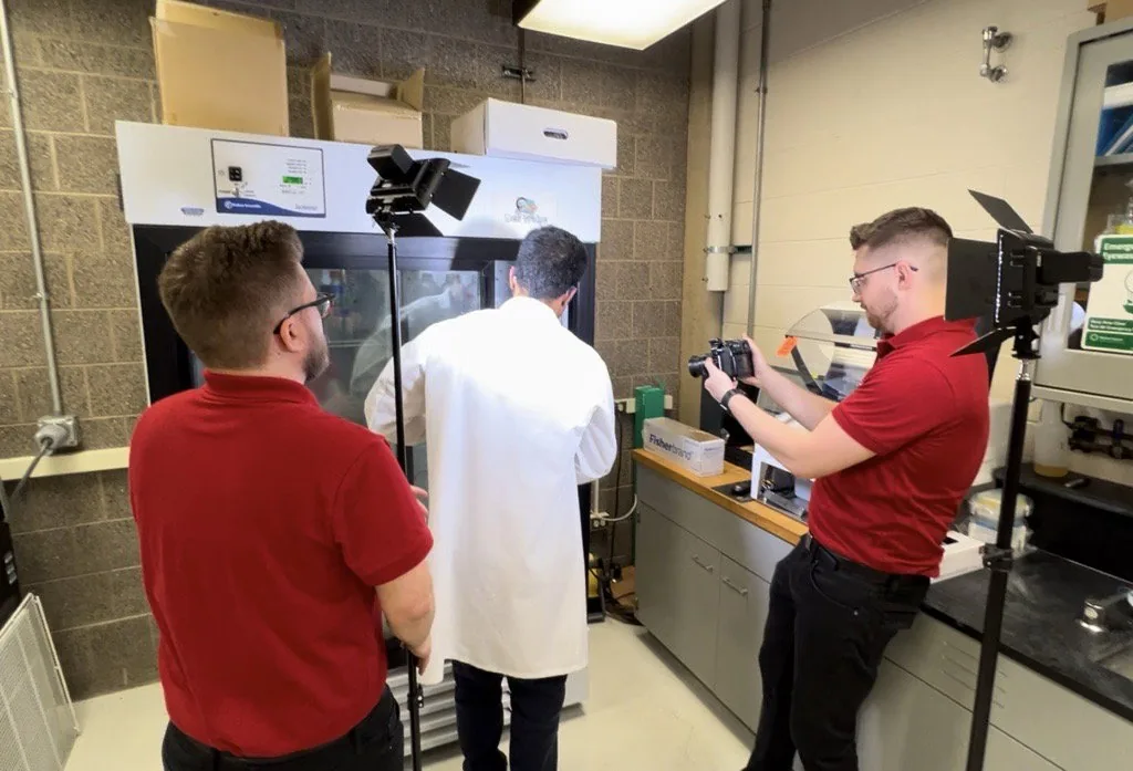 Bizful crew filming in a UIC lab